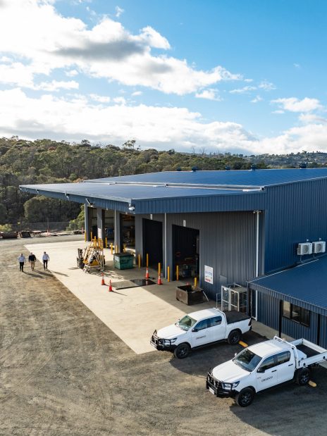 Large industrial workshop construction with wide vehicle access bays