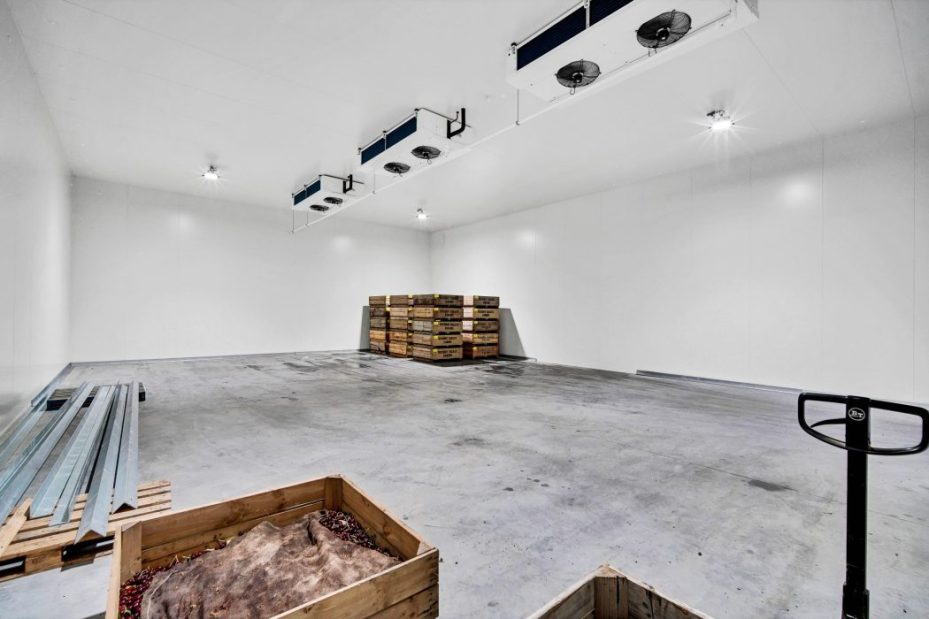 Cold storage room with pallet boxes prepared for agricultural produce in Tasmania