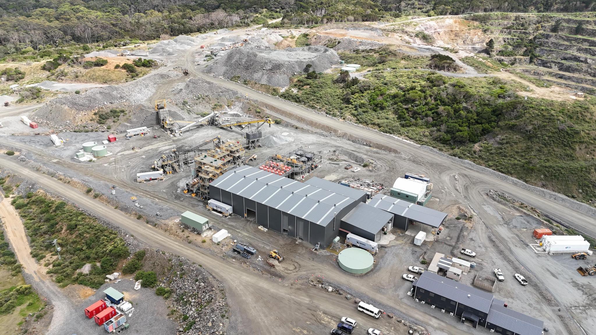 Aerial view of mining construction site with industrial buildings in Tasmania