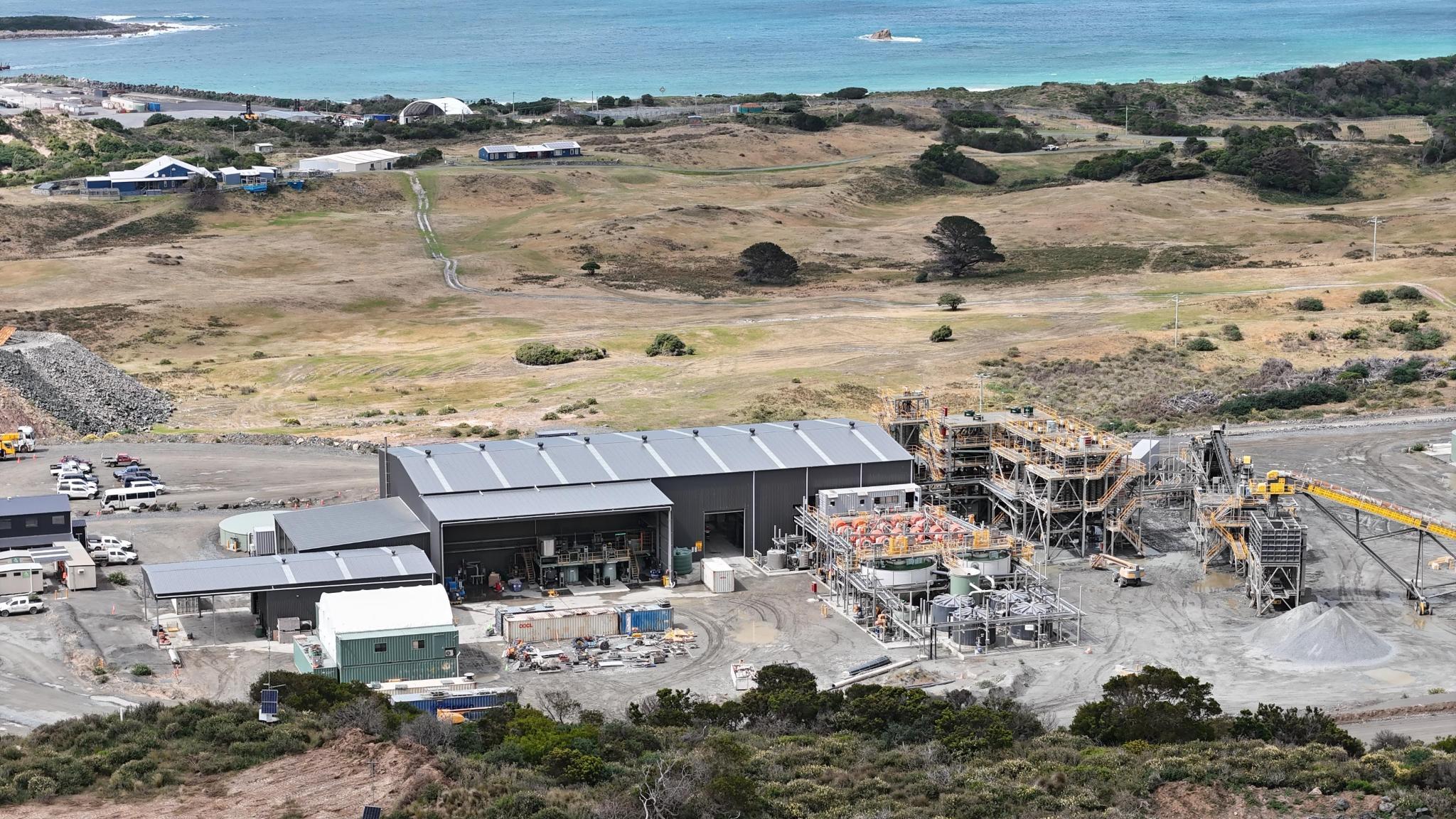 Aerial view of mining construction site with industrial buildings in Tasmania