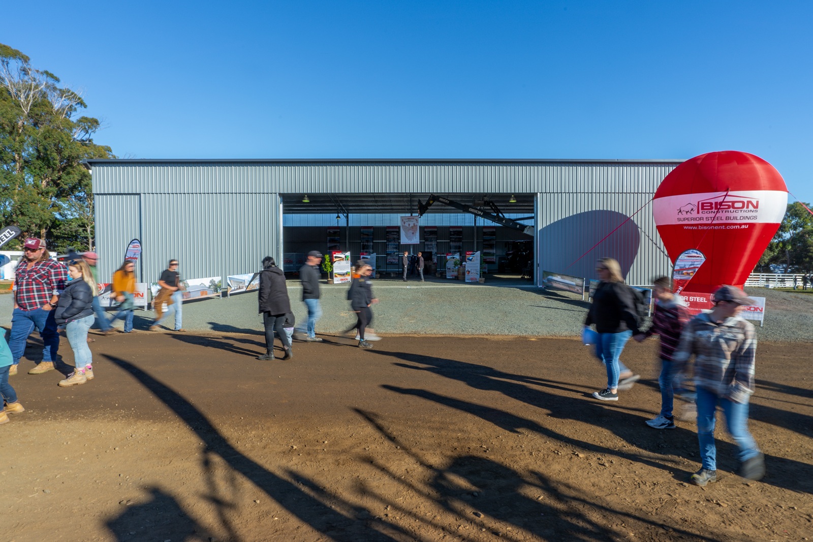 Outdoor display of industrial-grade buildings at Agfest 2024 event.