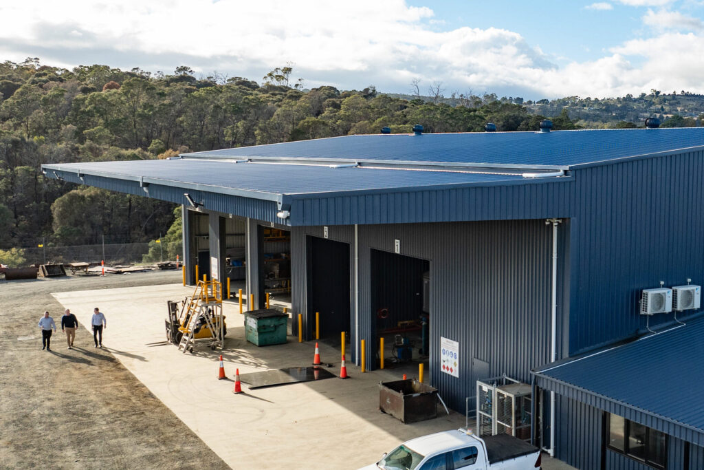 Large industrial workshop construction with wide vehicle access bays